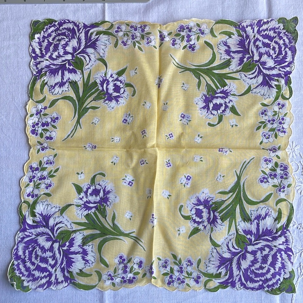 Vintage yellow w purple floral motif, scalloped edges, 13"